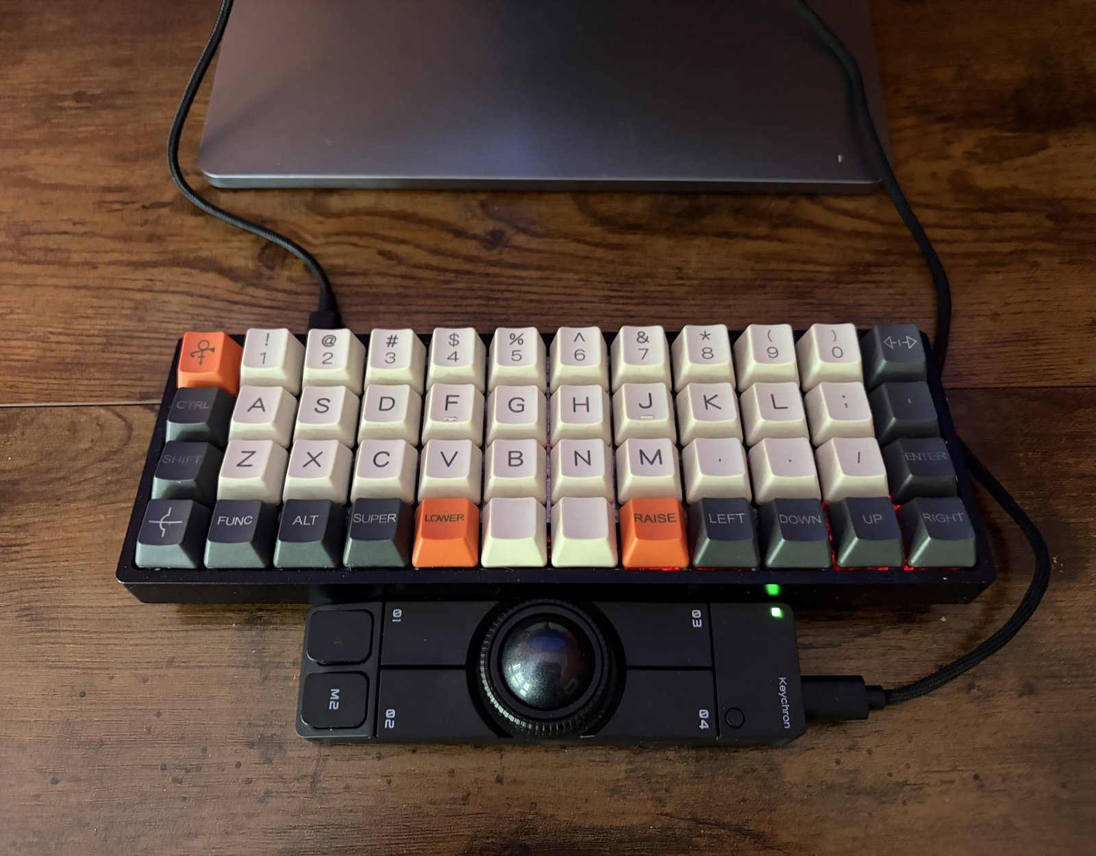 Planck ortholinear keyboard and Keychron Nape Pro trackball